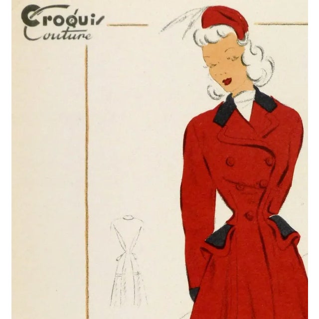 French fashion sketch of a woman wearing a luxurious red velvet coat. Color lithograph signed lower left, 1949. Original...