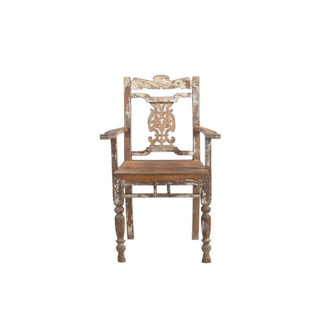 Vintage Anglo-Indian Teakwood Chair, with curved arms and a "Chippendale" carved back splat. C. 1900-50 This chair will...