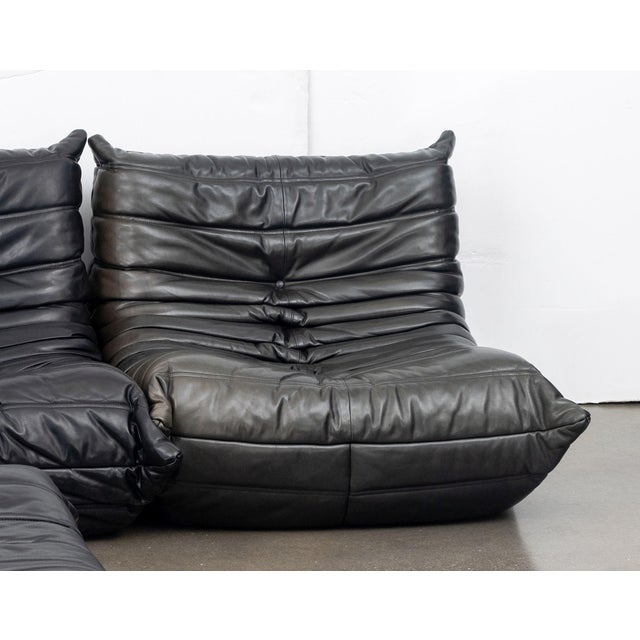 Michel Ducaroy (French, 1925-2009) for Ligne Roset "Togo" Black Leather Upholstered Modular Sofa, in four pieces with...
