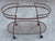 Vintage Woodard style wrought iron bar cart. Original finish with no glass insert, giving you the option to repaint and...