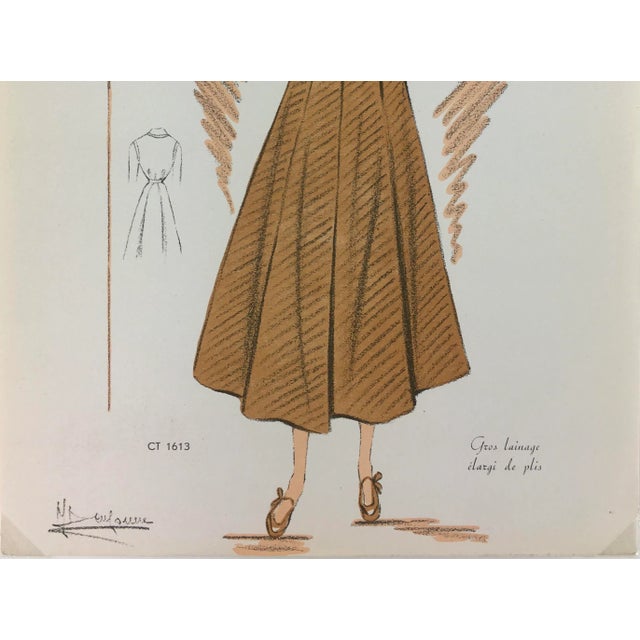 Vintage French fashion sketch of a woman in a beige wool coat. Color lithograph signed lower left, 1949. Original artwork...