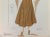 Vintage French fashion sketch of a woman in a beige wool coat. Color lithograph signed lower left, 1949. Original artwork...