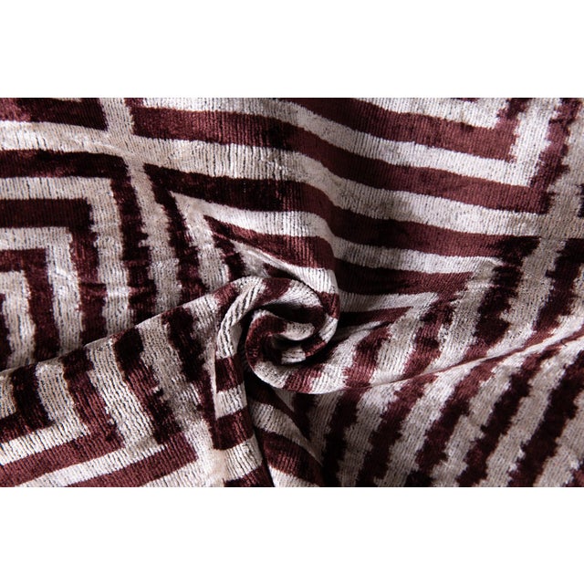 "Handcrafted velvet throw pillow made with organic vegetable dyes for an authentic and natural aesthetic. Filled with a...