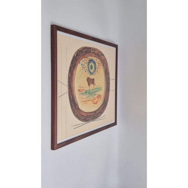 An exquisite framed shiny polychrome print of Picasso Vallauris ceramic plates depicting a bull in the sun. The color...