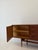 Vintage Teak Sideboard from Musterring, 1970s, in Flawless conditions. Designed 1970 to 1979 This piece has an attribution...
