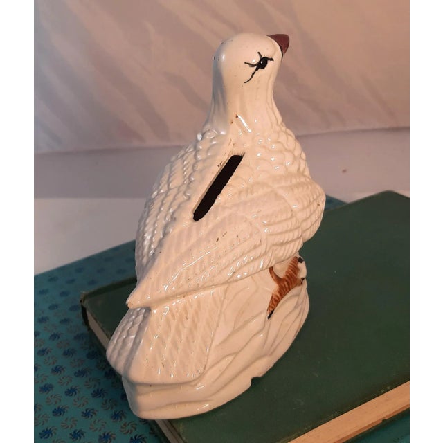 Hand painted white bird, possibly dove figurine. Not signed. Era last mid century. Heavy pottery no chips, bubble in...