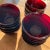 This set of ruby red bowls have various attributions: some reference them as the discontinued French Arcoroc Vercors Ruby...