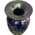 This hand blown glass vase incorporates browns, greens, and copper sparkle on a dark blue ground. I love the accents of...