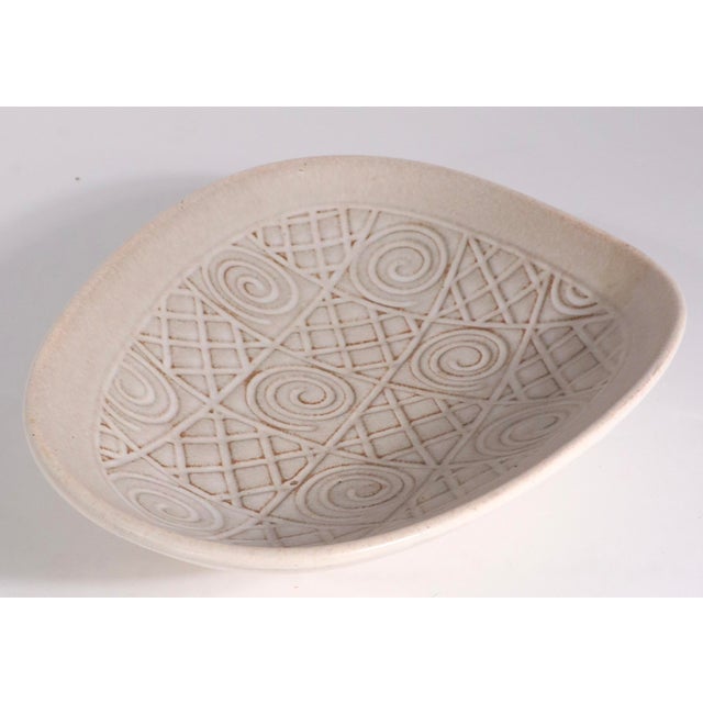 Mid Centiury pottery bowl, made in Germany by Jasba, as part of the Ethno series, circa 1960's. The bowl features a...