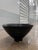 Beautiful ribbed ceramic bowl, in a dramatic black finish , use as a catch all in office on a desk, or great as accent for...