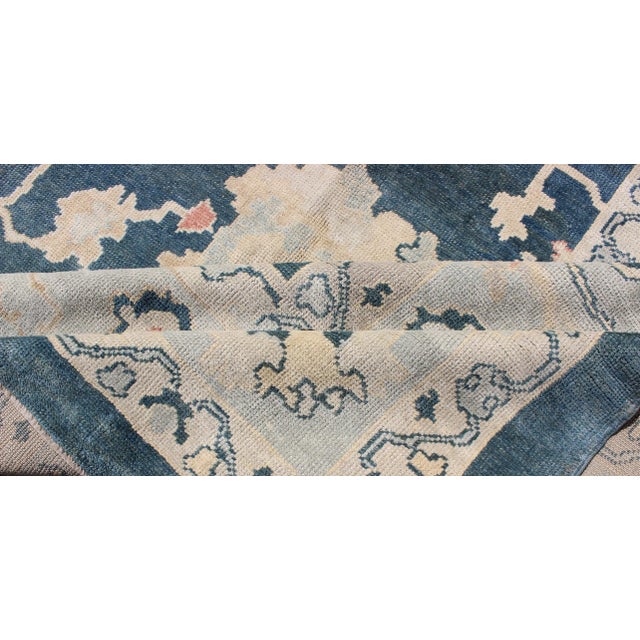Large Turkish Oushak Rug With Dark Teal Blue Background & Ice Blue Border For Sale - Image 11 of 12