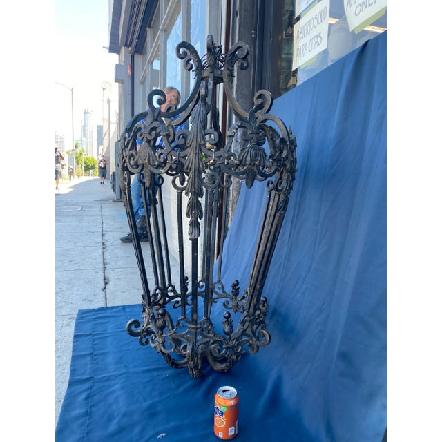 Such an amazing grand pendant chandelier from the 1920s! This light is very old and has such great character to it. The...