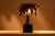 Maison Jansen, par. Gilded brass lamp representing a palm tree resting on its square base. French work from the 1950s....