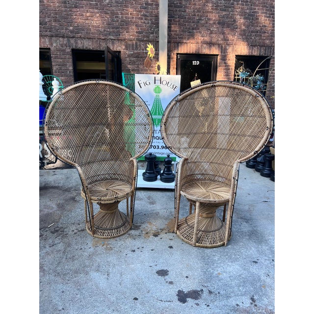 Stunning matching pair of vintage 1970s peacock chairs! Perfect accents to add to any decor or perfect for that special...