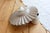 Vintage glazed ceramic pendant light in a soft lilac shade with taupe undertones. Its generously pleated shape and...