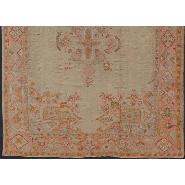 Tribal Antique Oushak Carpet With Medallion on a Pale Green Field With Vivid Border 9'11"x13'5" For Sale - Image 3 of 12