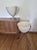 Truly amazing set of oriiginal Mid Century modern bullet planters. They are made of fiberglass with metal tripod stands....