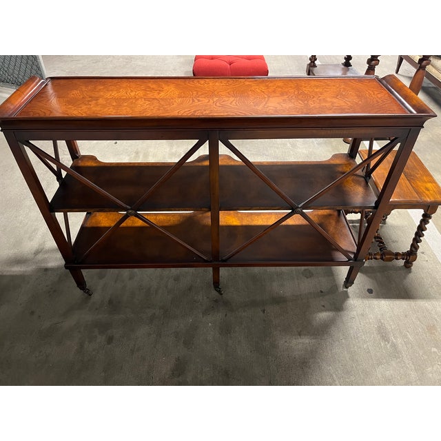 Beautiful three-tier console/server table in the English Regency style, featuring a gallery-rail top with rich burl wood...