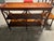 Beautiful three-tier console/server table in the English Regency style, featuring a gallery-rail top with rich burl wood...