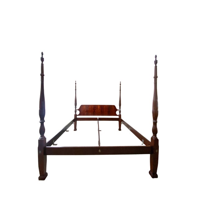 Stunning vintage king sized four poster bed by Craftique, Inc. Crafted from high-qualtiy solid mahogany, this exceptional...