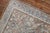 a scatter size Persian rug from the early 20th century featuring a dragon design Measures: 3'5'' x 4'11''.