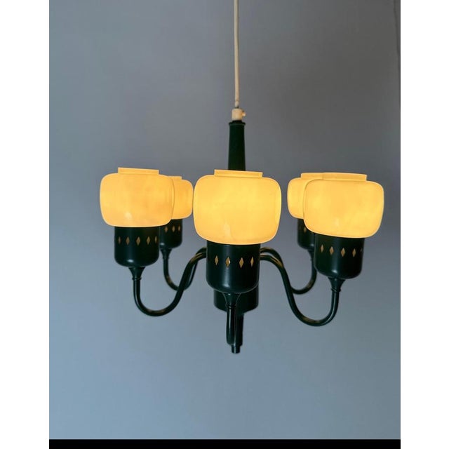 Model 526 in forest green is a very rare chandelier by Hans Agne Jakobsen. Small but impressive, it shows the artist's...
