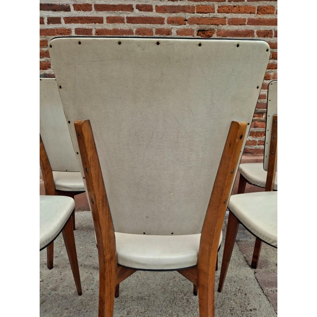 A guaranteed favorite for post-war design enthusiasts! Here is an extremely rare set of six Mid-Century Modern dining...