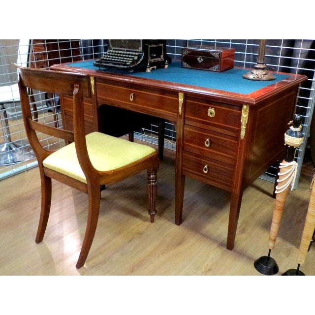 There are pieces of furniture that define a room, and then there is this desk. A masterful execution of the Neo-Empire...