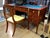 There are pieces of furniture that define a room, and then there is this desk. A masterful execution of the Neo-Empire...