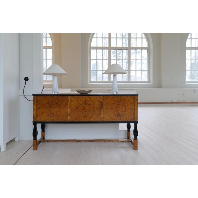 Table lamps in crystal, model rd 1566 by carl fagerlund for orrefors, sweden. The lamps have a white color with clear...