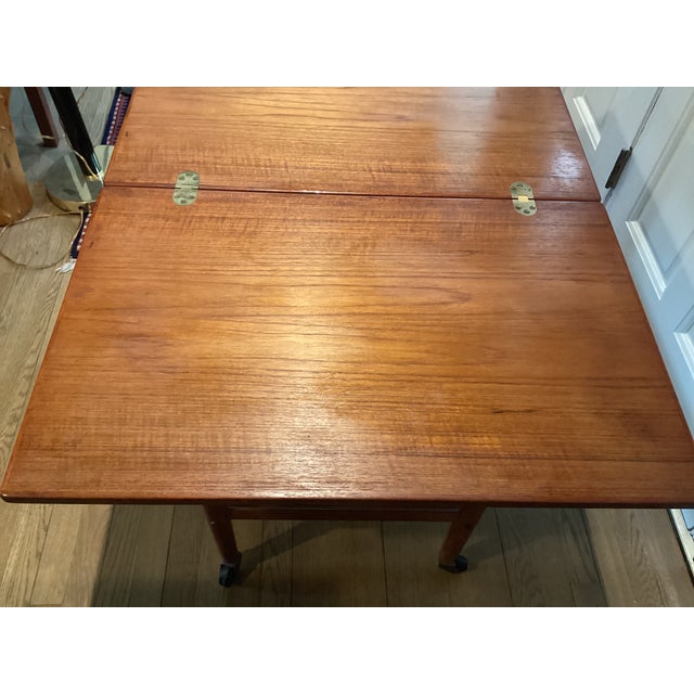 1970s Midcentury Modern Teak Rolling Expandable Table With Shelf For Sale - Image 9 of 12