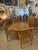 5 Piece bamboo and rattan Dining table or game table with 4 arm chairs. You can add glass to the top or leave as is being...