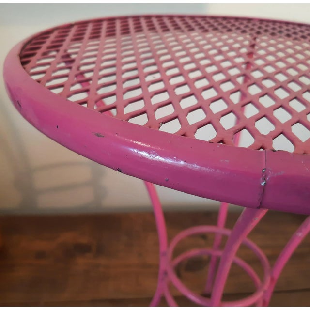 Super cute hot pink side table, perfect size for outdoors or inside! Trending pink color! Very sturdy, no bends or breaks....