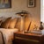 Featuring a striking combination of dark walnut and weathered brass, the Boomerang Table Lamp is a modern table lamp with...
