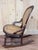 Victorian Vintage Victorian Mahogany Cane Back Rocking Chair With Carved Crest For Sale - Image 3 of 7