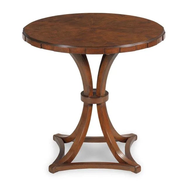A lovely table inspired by 18th Century Georgian architechture. A circular cerejeira top is accented by a dentil perimeter...