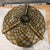 Incredible diamond shaped gold and green stained glass pieces with amber accents along the bottom rim. Raised structural...