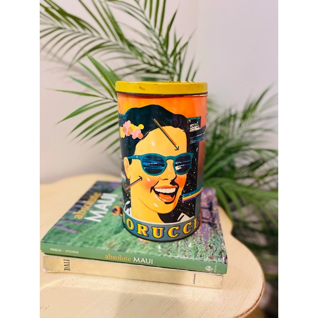 Vintage Fiorucci tin can display pop art fashion colorful. Circa 1970s