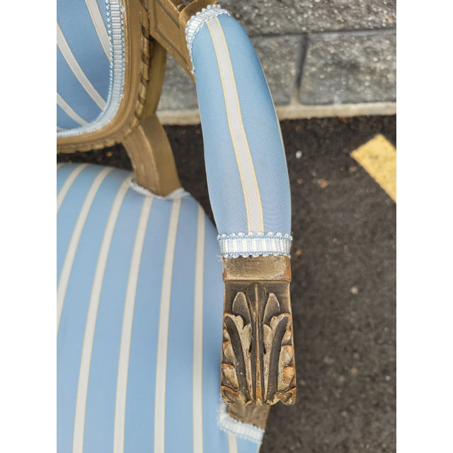This is Louis XVI at its best. With a painted frame, this chair features a stunning blue and white silk upholstery fabric,...