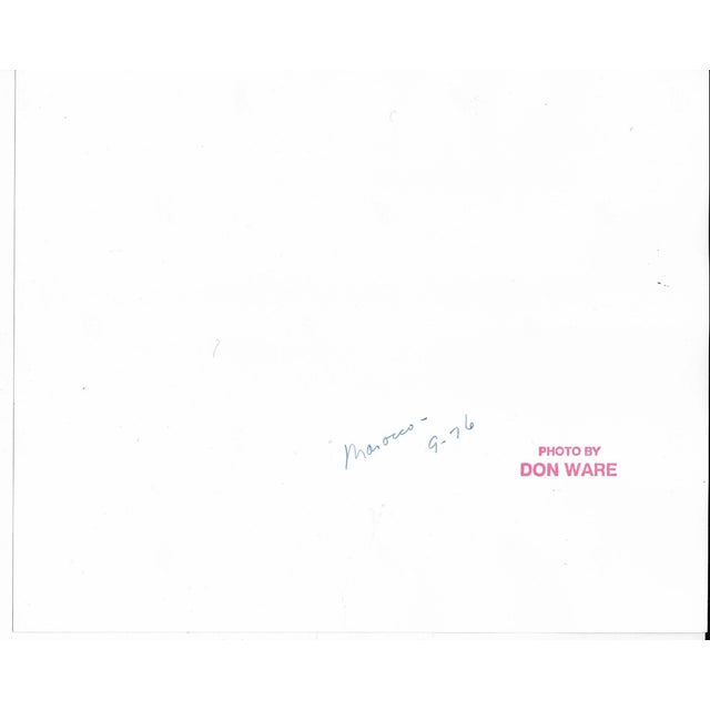 1976 black and white photo by Don Coleman Ware (1921-2006) of a street in a city in Morocco. Titled, dated and bearing...