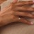 This elegant Art Deco diamond engagement ring is a refined 1930’s design, centered by a transitional brilliant cut diamond...