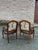 Beautiful vintage pair of armchairs with detailed needlepoint upholstery on both sides of the backrest, faux leather seats...