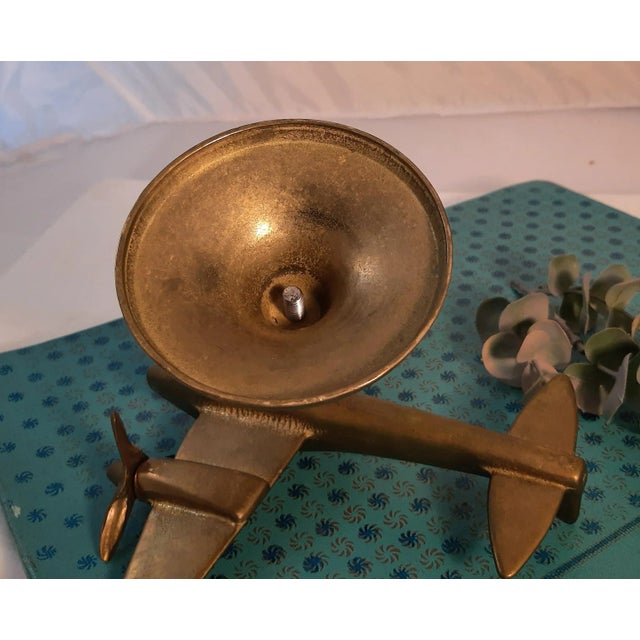 Vintage brass airplane. No makers mark. Propellers spin. Great for desk, tabletop or shelf. Please use photos as part of...