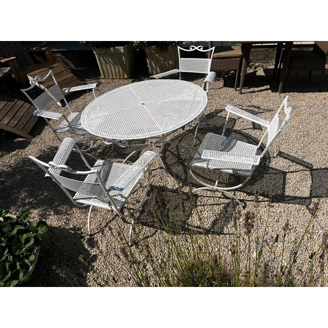 Beautiful maison jansen white wrought iron dining set, the backs of the chairs adorned with a knot. seats, backs,...