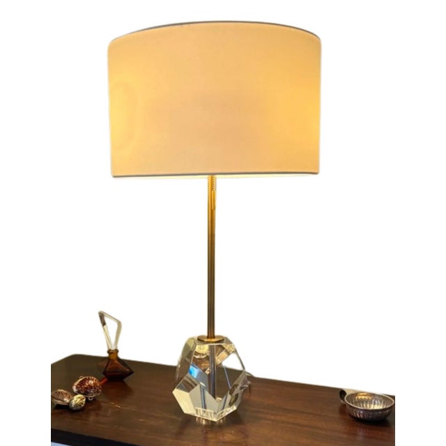 Clear glass faceted base, 6" diameter. Brass pull chains operation with double cluster socket accommodating 60 W bulbs....