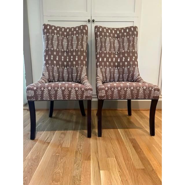Pair of George Smith dining or side chairs upholstered in John Robshaw’s “Chiang Mai” in color walnut. I can't find any...