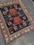 A striking antique Kazak rug distinguished by its bold geometry and timeless tribal character. Woven circa 1920s, this...
