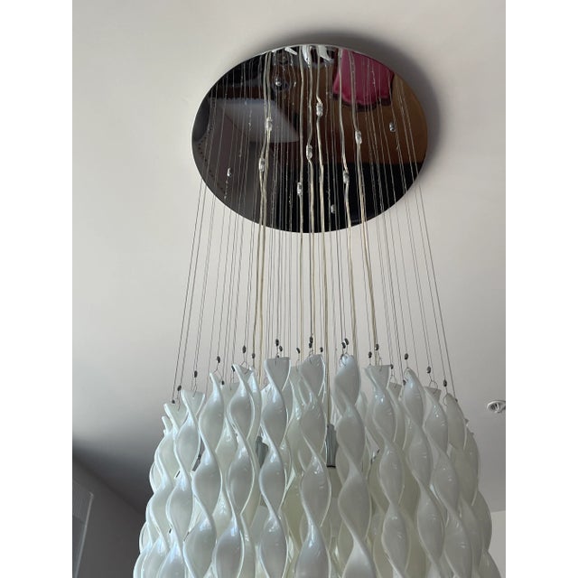 The modern classic AVIR Suspension light, designed by the Italian designer Manuel Vivian, features double-layered hand...