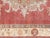 This vintage Turkish Oushak rug, measuring 7'4" x 10'9", is handwoven with wool on a wool foundation in the Oushak region...
