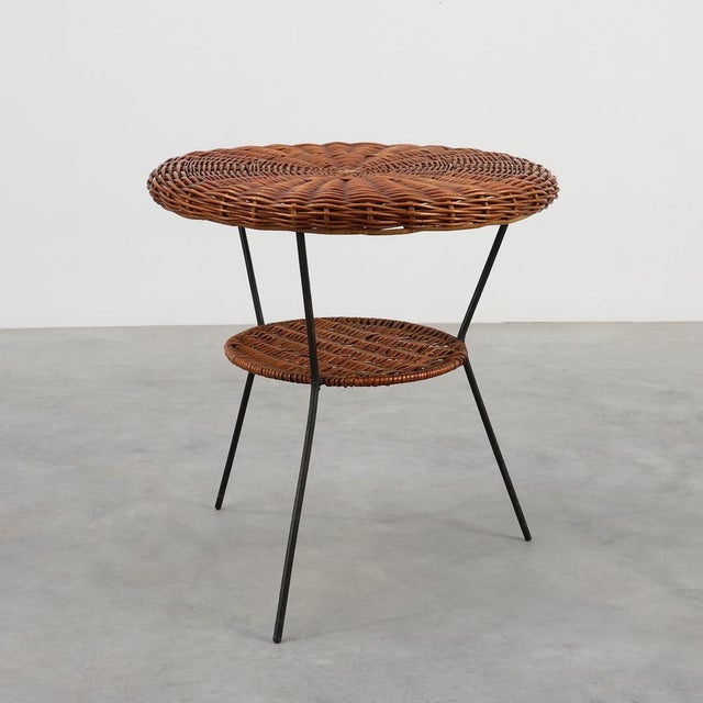 Bring organic warmth and the effortless charm of the mid-century era into your interior with this exceptional round coffee...
